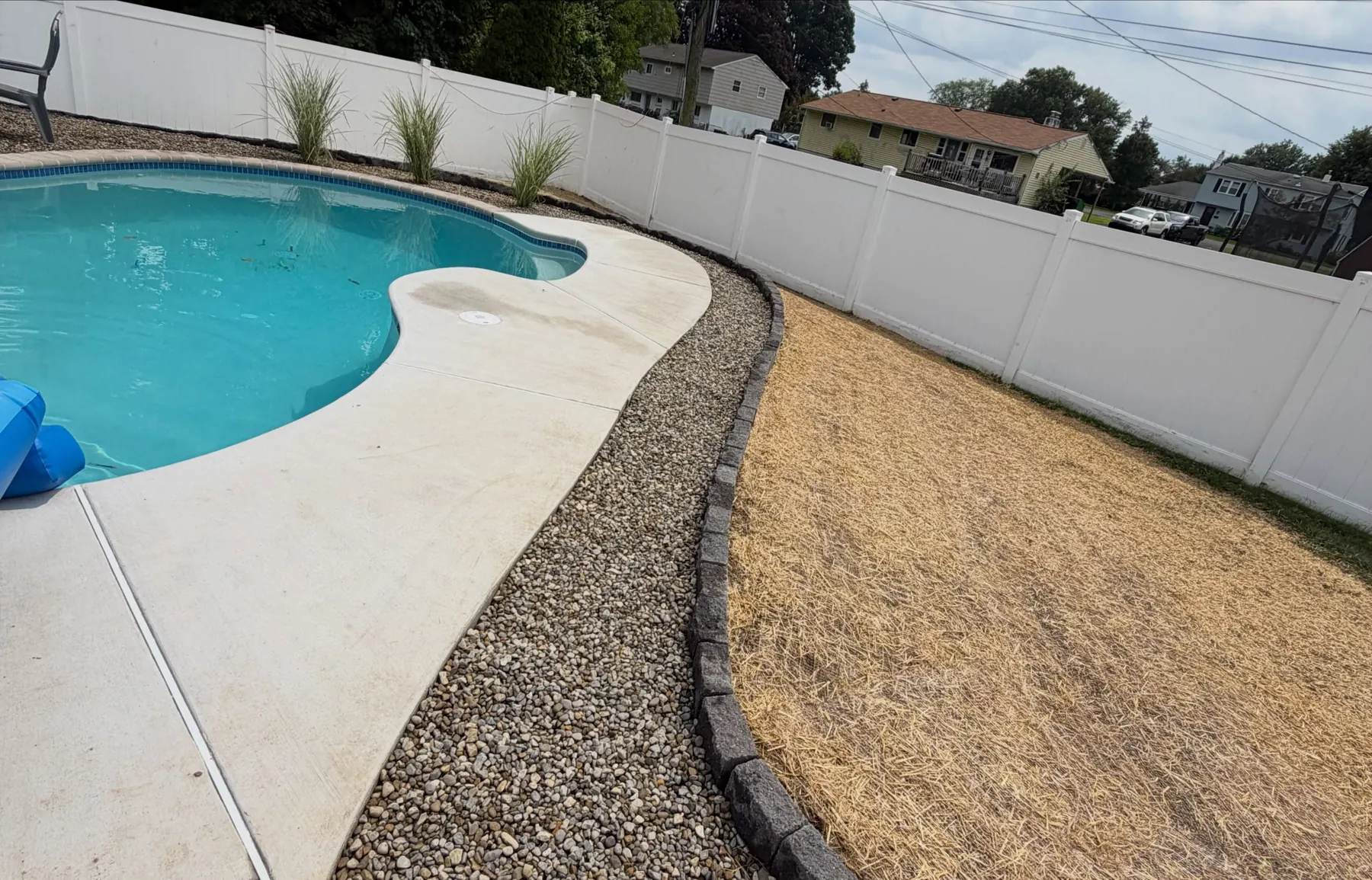 MTB Landscaping’s completed landscape work around a backyard pool in Warminster